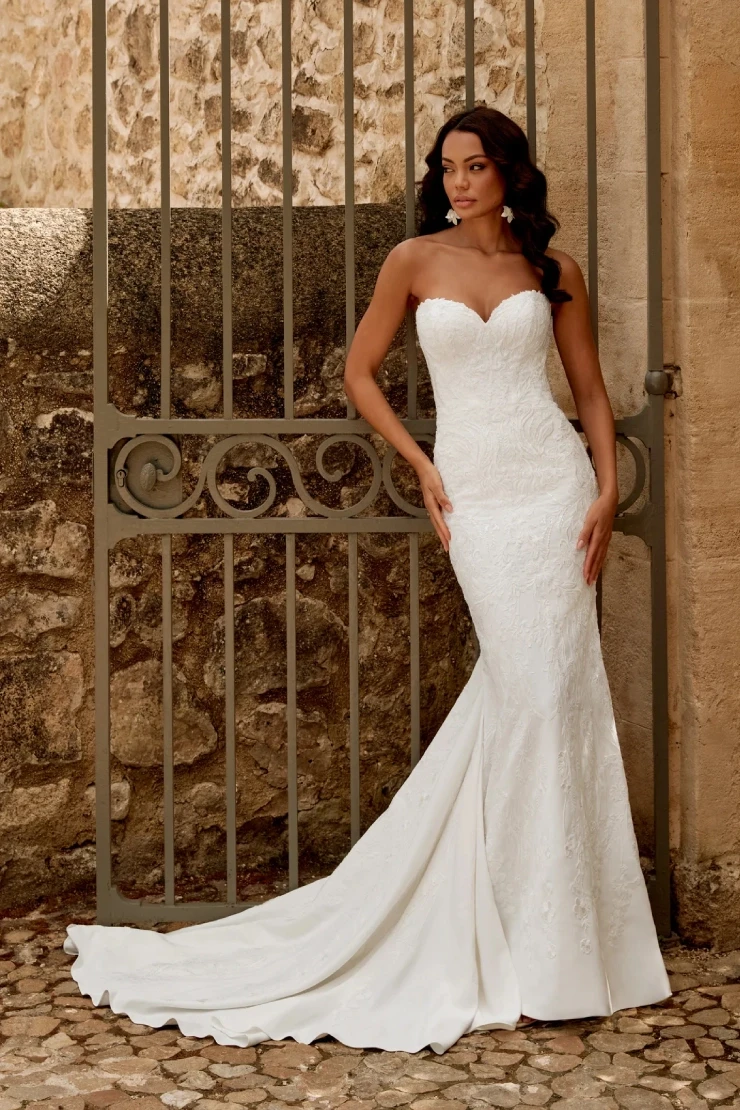 Model wearing white Sincerity Bridal dress