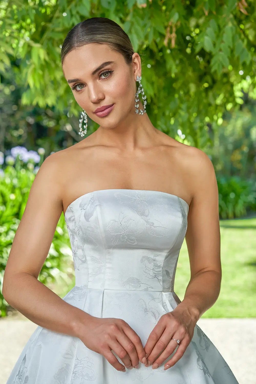 Model wearing white Jasmine Bridal dress